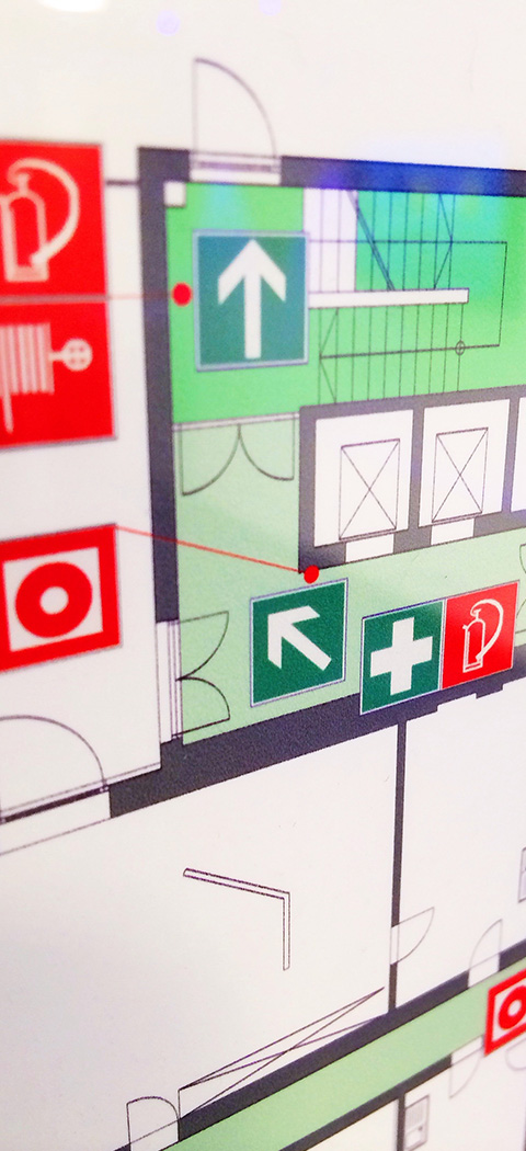fire safety map showing emergency exit routes including an upward arrow and left turn indicator with multiple symbols related to safety features in a building 7 essential emergency elements